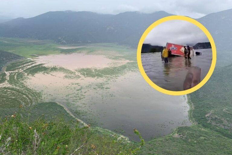 Imagen: En Eloxochitlán, lluvias hacen crecer el nivel de laguna y que camioneta se hunda